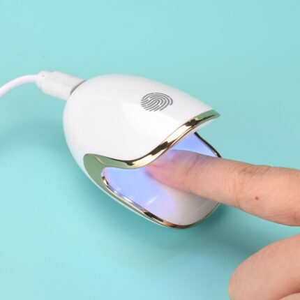 Sèche ongles chauffante LED portable 6W pour un doigt, à usage domestique, sans noirceur.