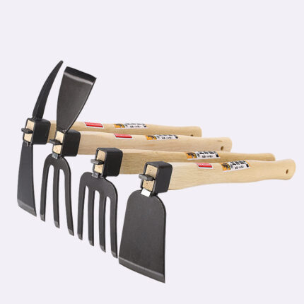 Petit objet contenant des outils agricoles domestiques de type houe